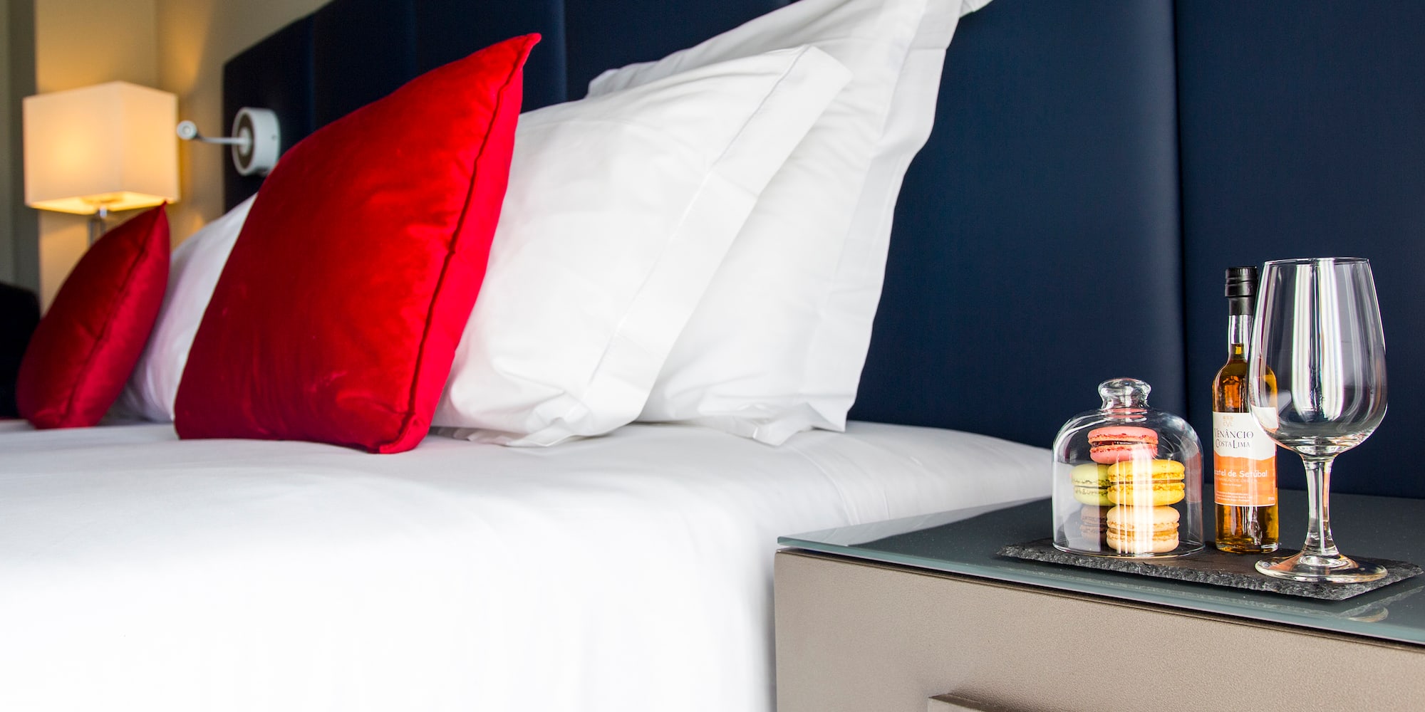 a bed with a glass bell on top