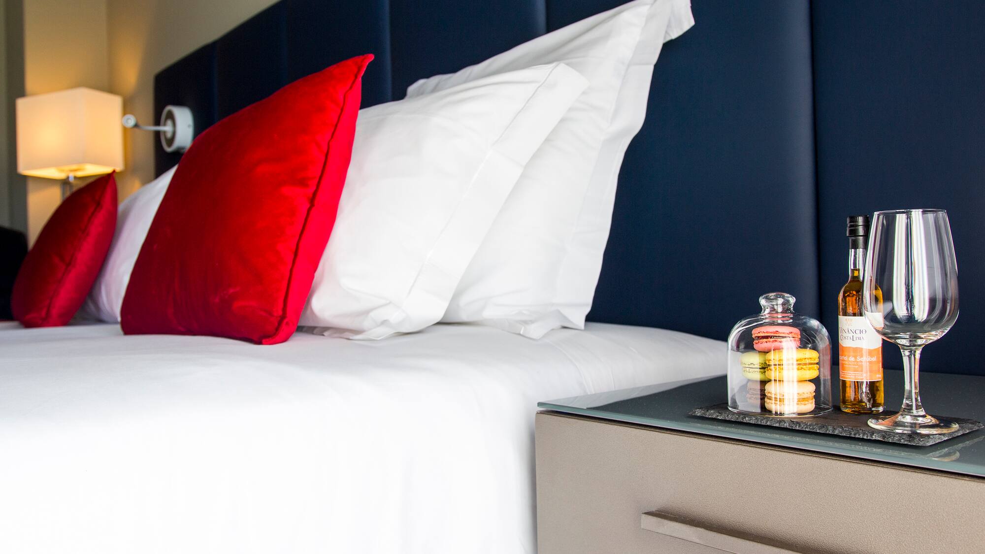 a bed with a glass bell on top