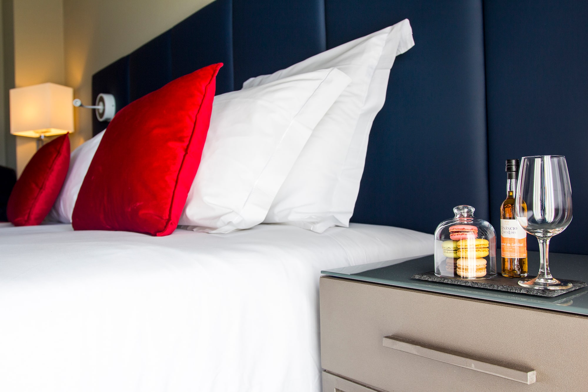 a bed with a glass bell on top