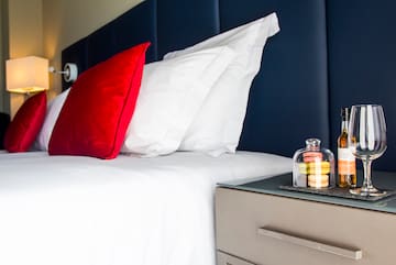 a bed with a glass bell on top