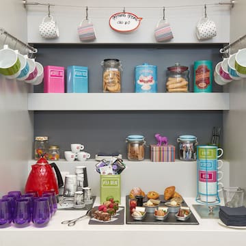 a shelf with cups and cups on it