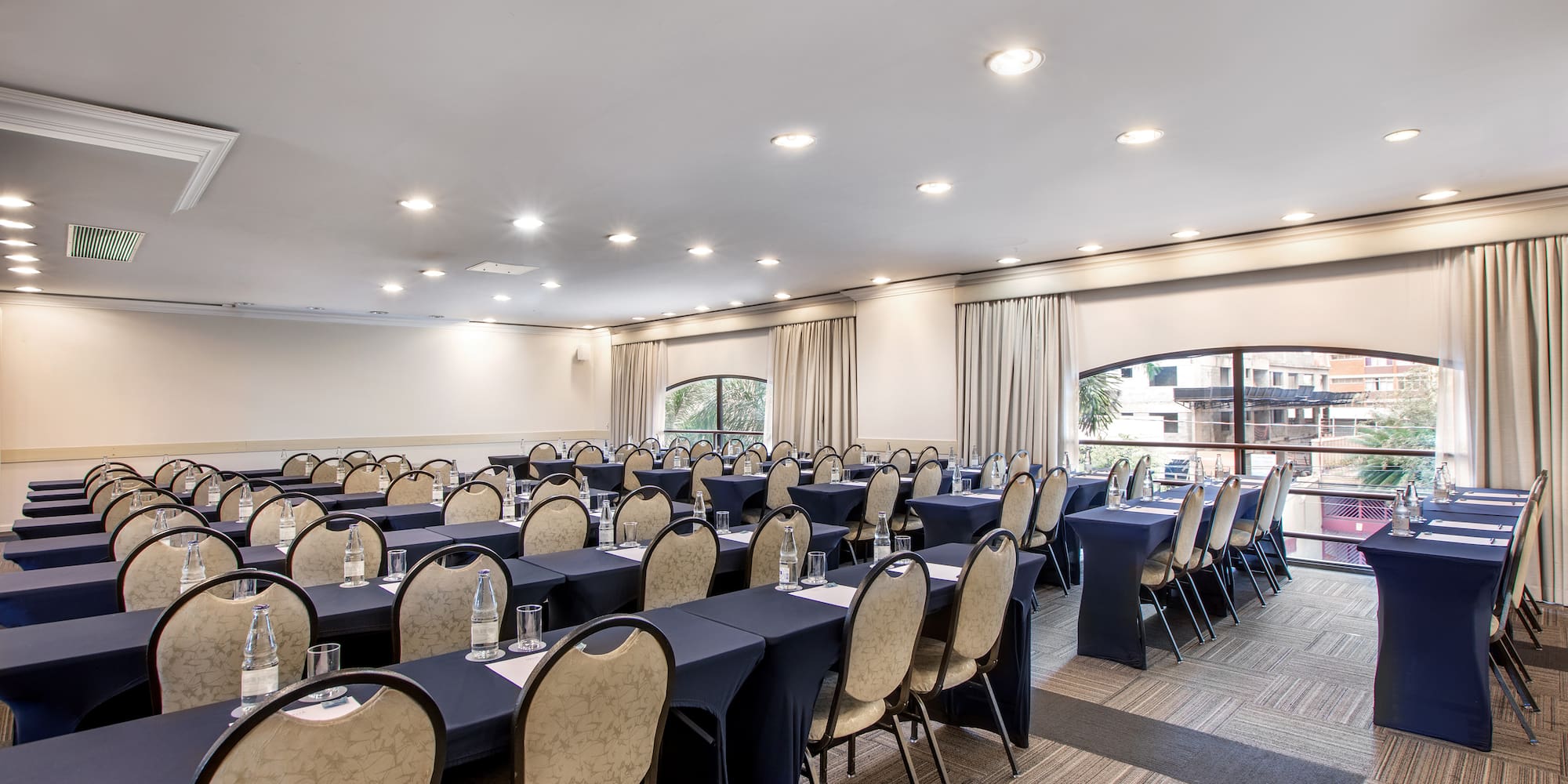 a room with tables and chairs