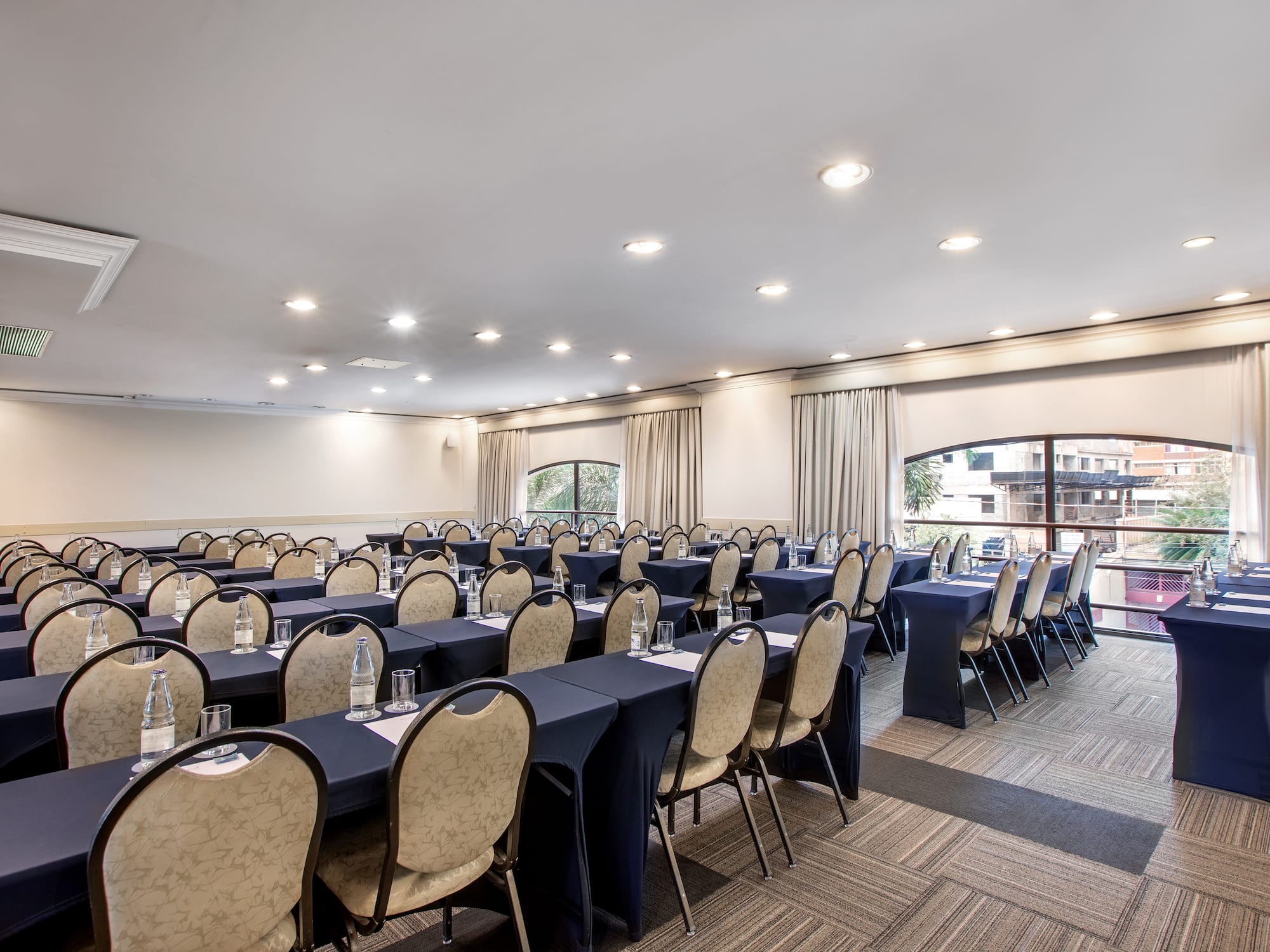 a room with tables and chairs