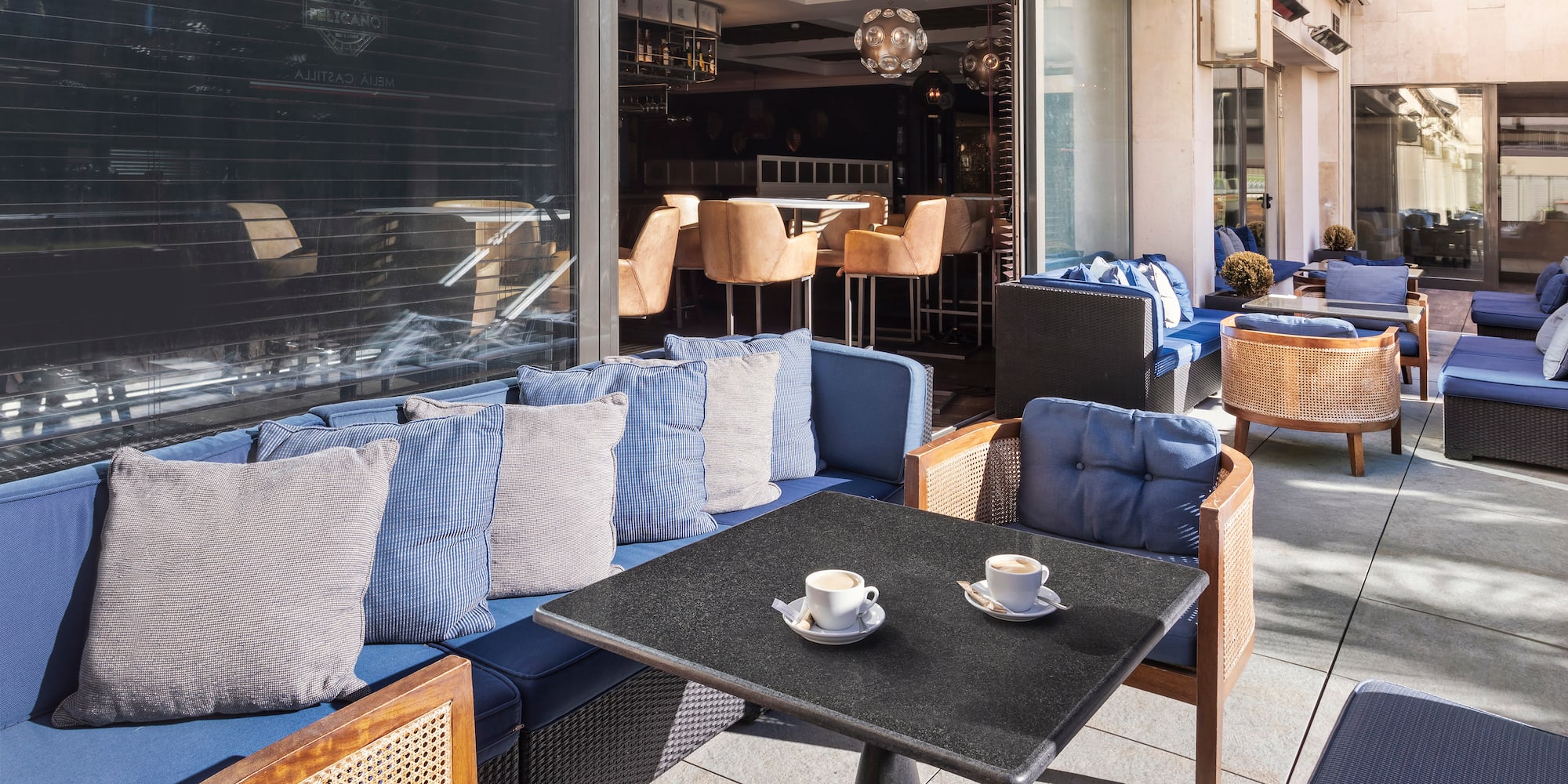a table and chairs outside of a restaurant