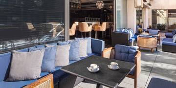 a table and chairs outside of a restaurant