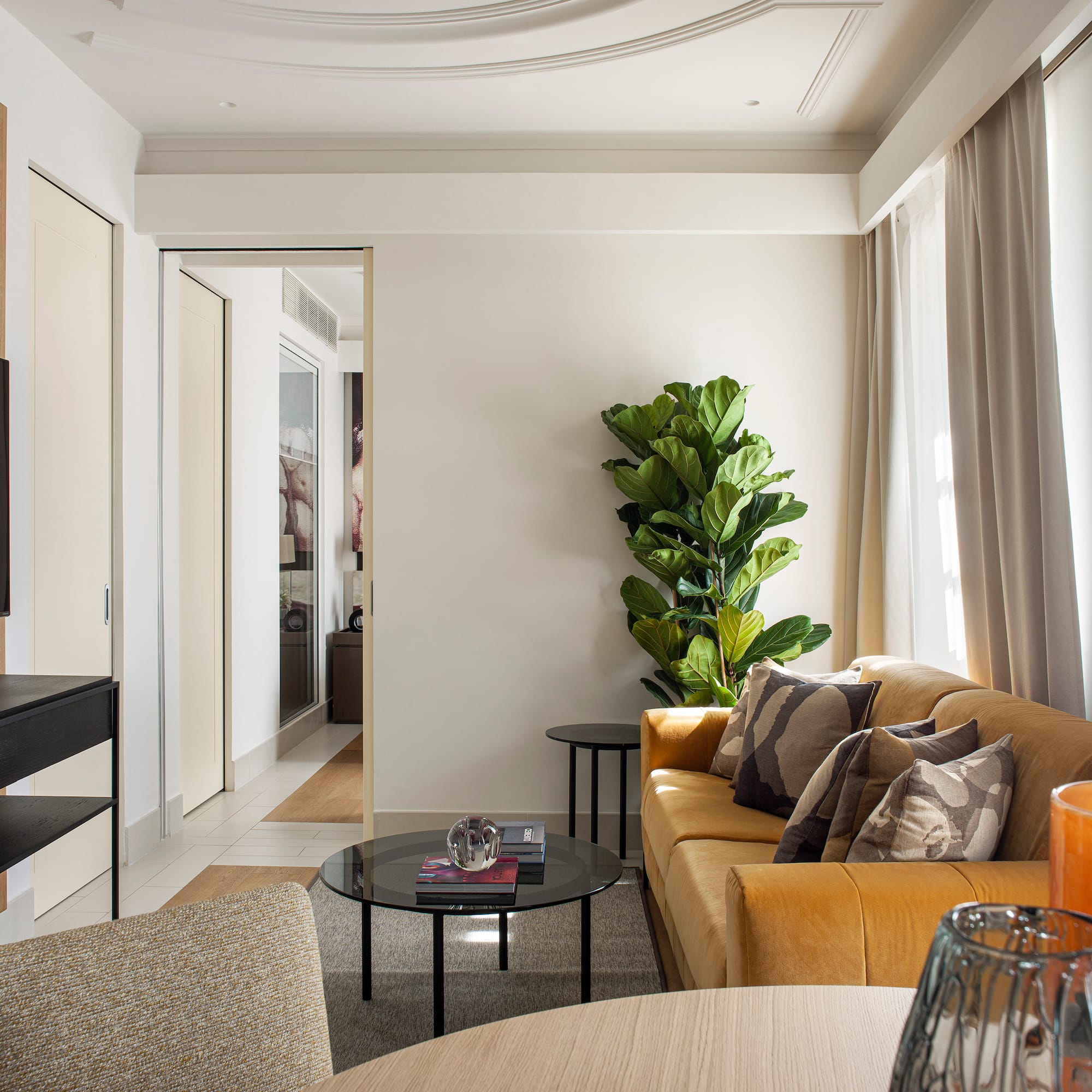 a living room with a couch and a tv