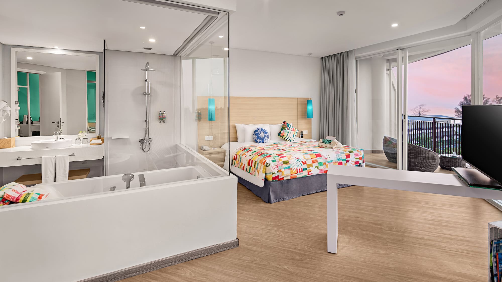 a room with a bathtub and a bed