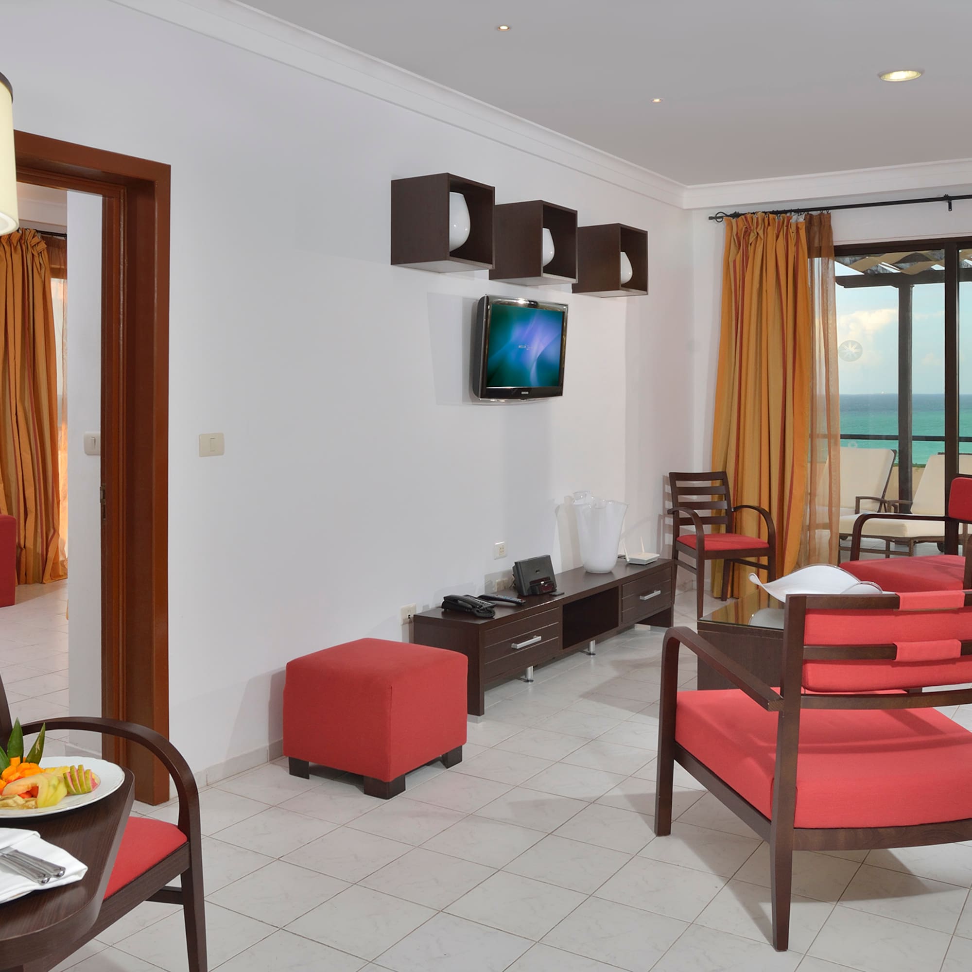 a room with a television and a table