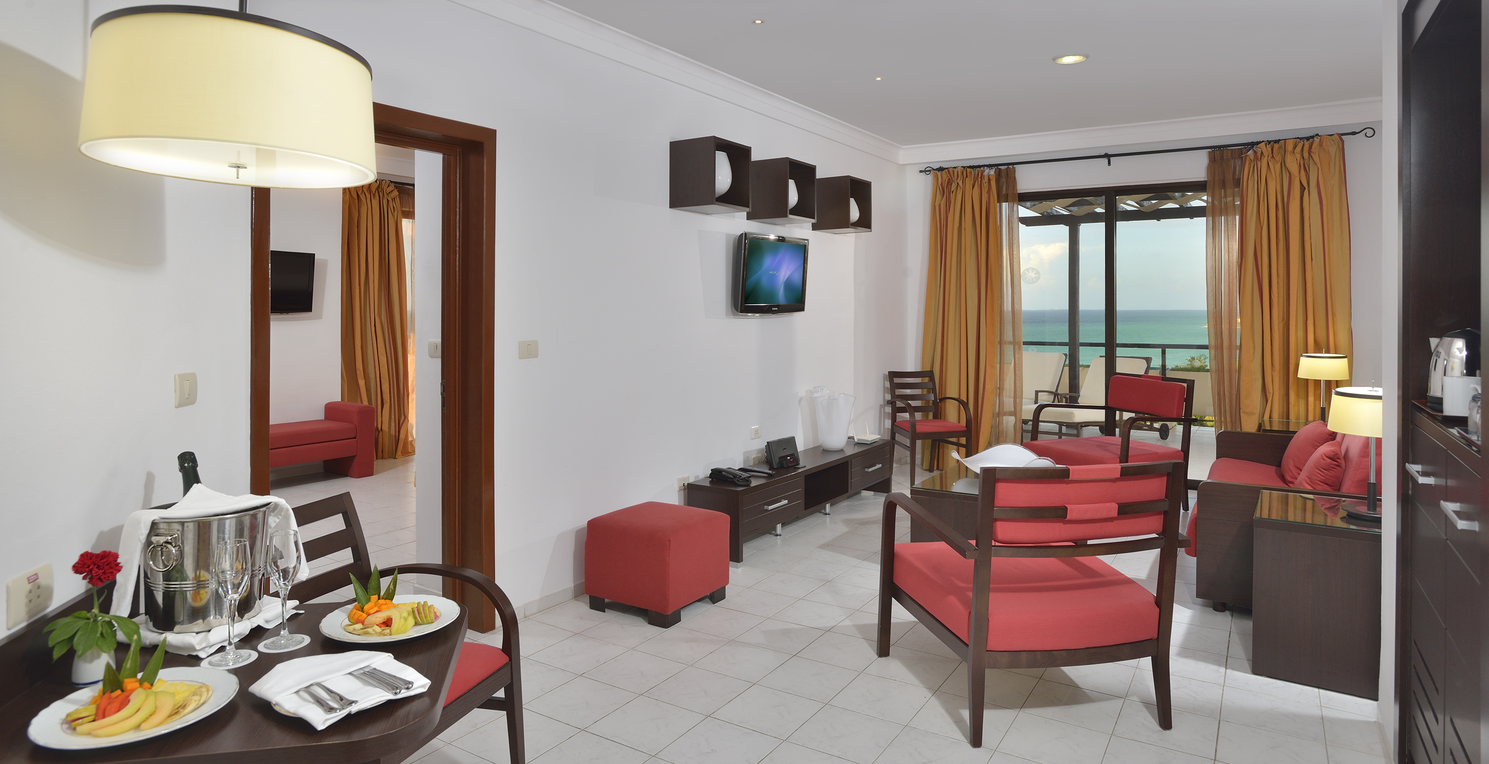 a room with a television and a table