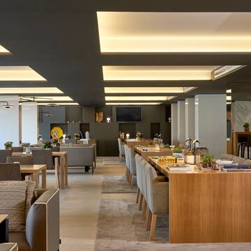 a room with tables and chairs