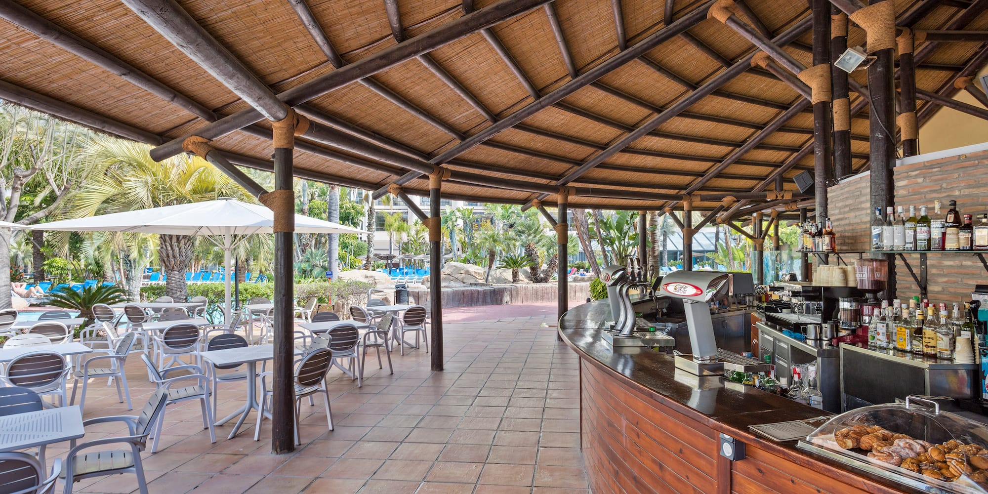 a restaurant with tables and chairs