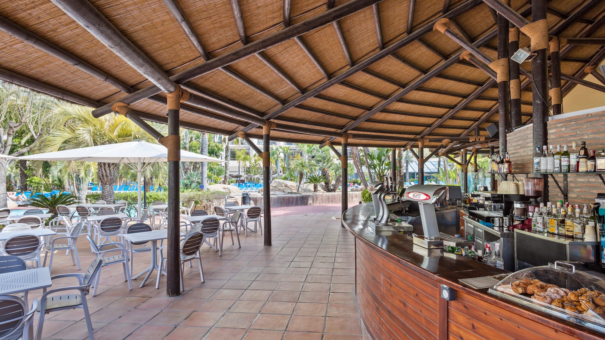 a restaurant with tables and chairs