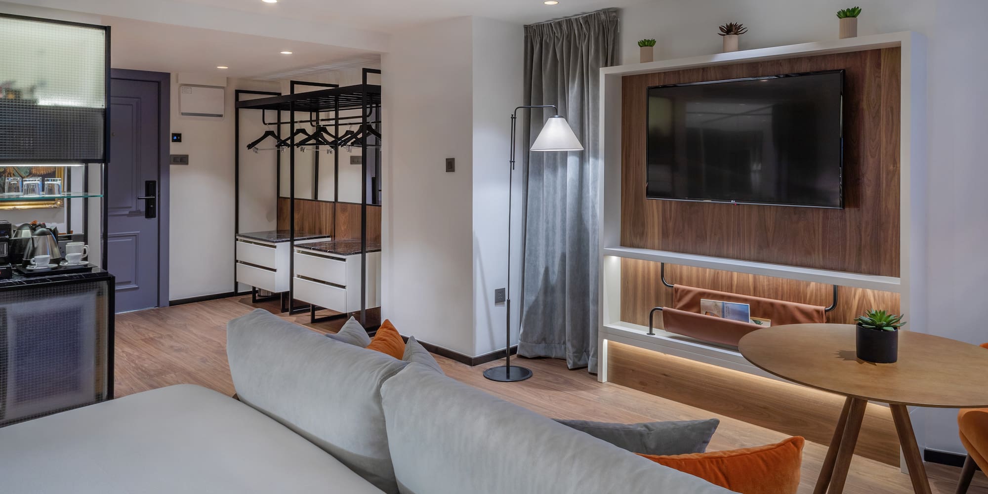 a living room with a tv and a couch