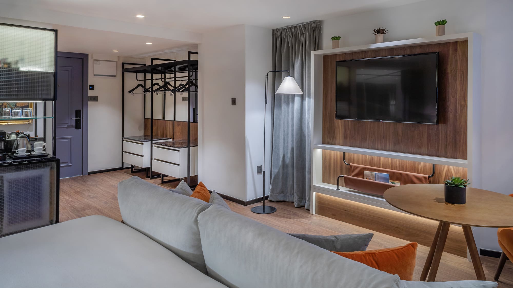 a living room with a tv and a couch