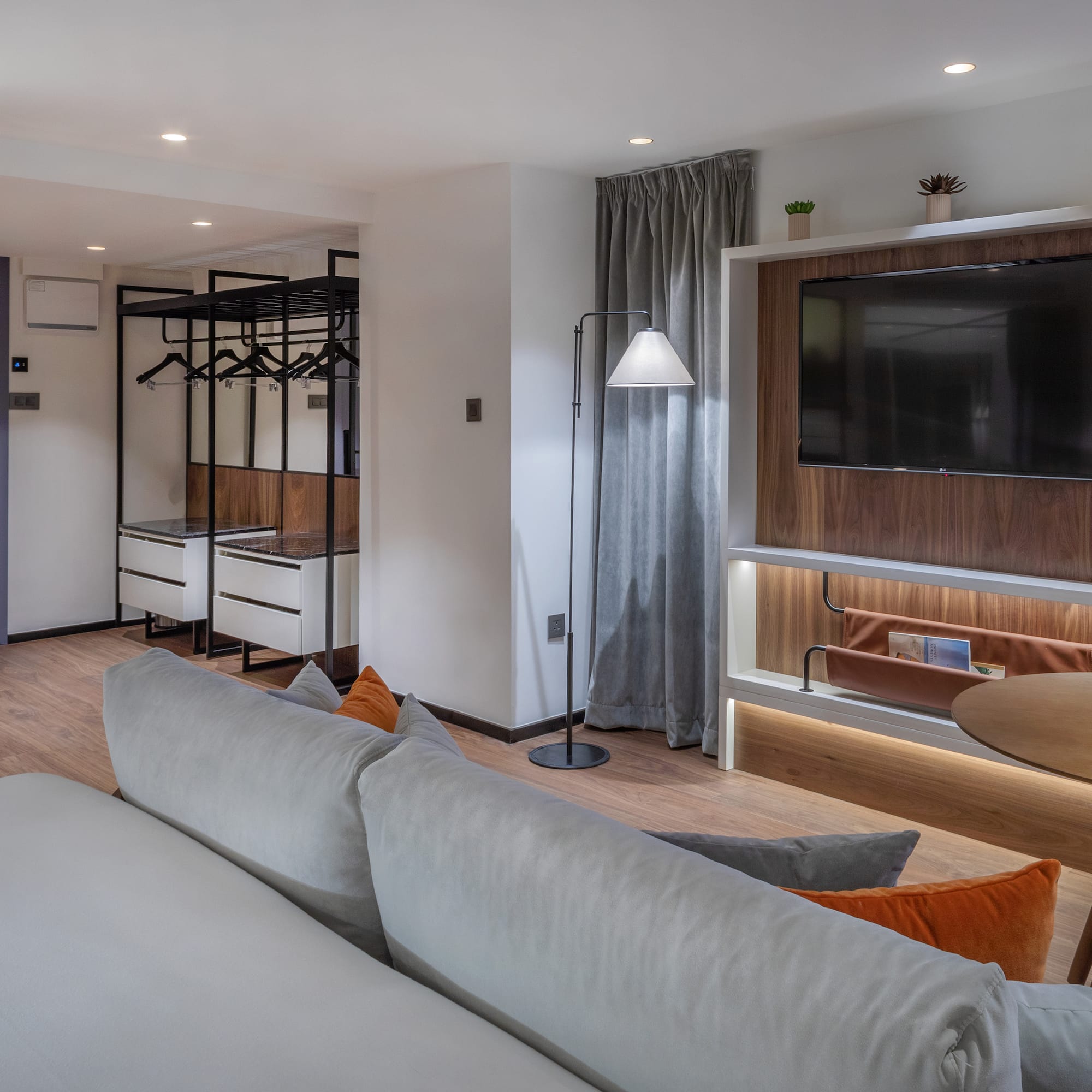 a living room with a tv and a couch