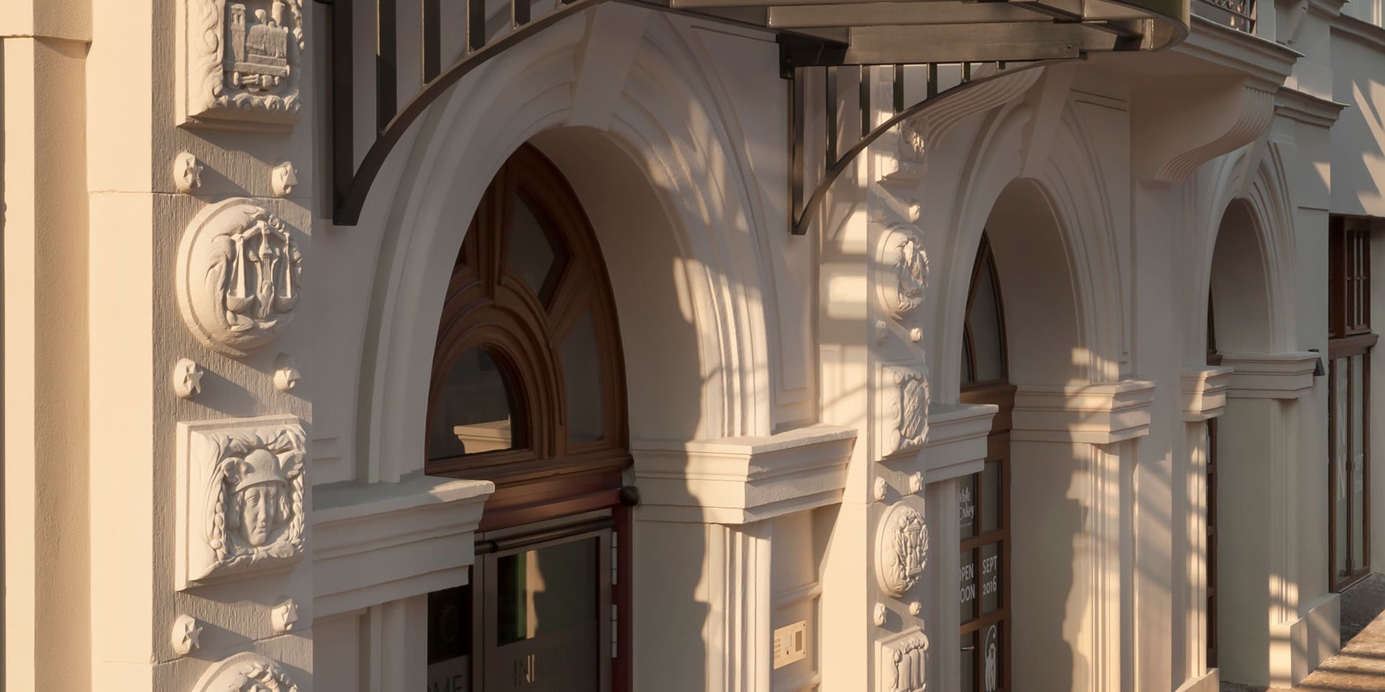 a building with a balcony and a door