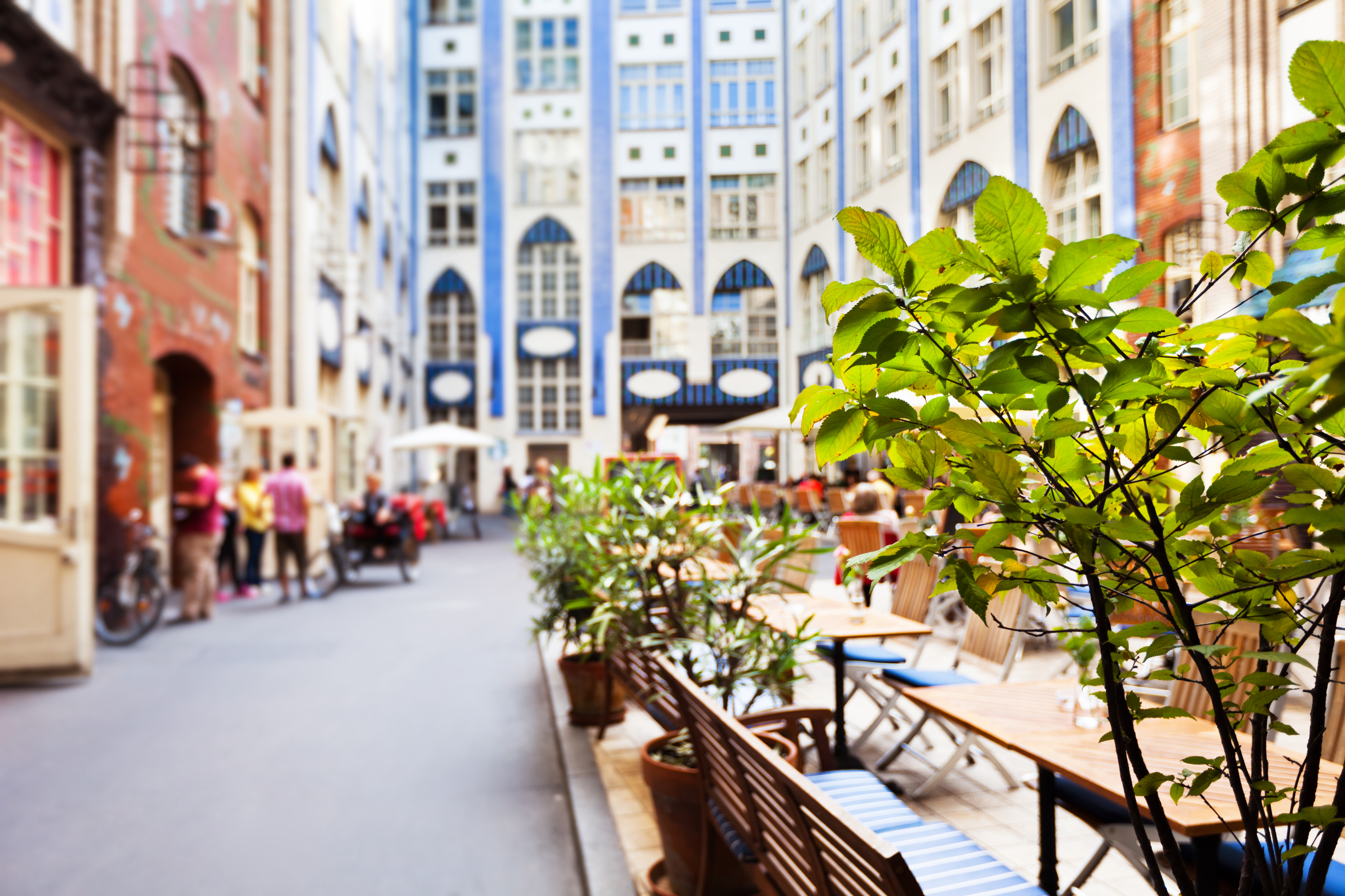 a group of people walking in a city