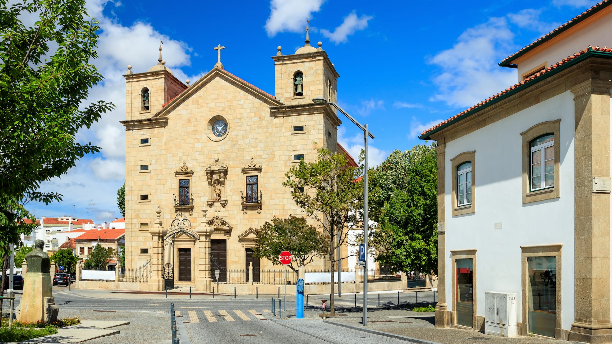 a building with a cross on the roof
