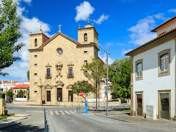 a building with a cross on the roof
