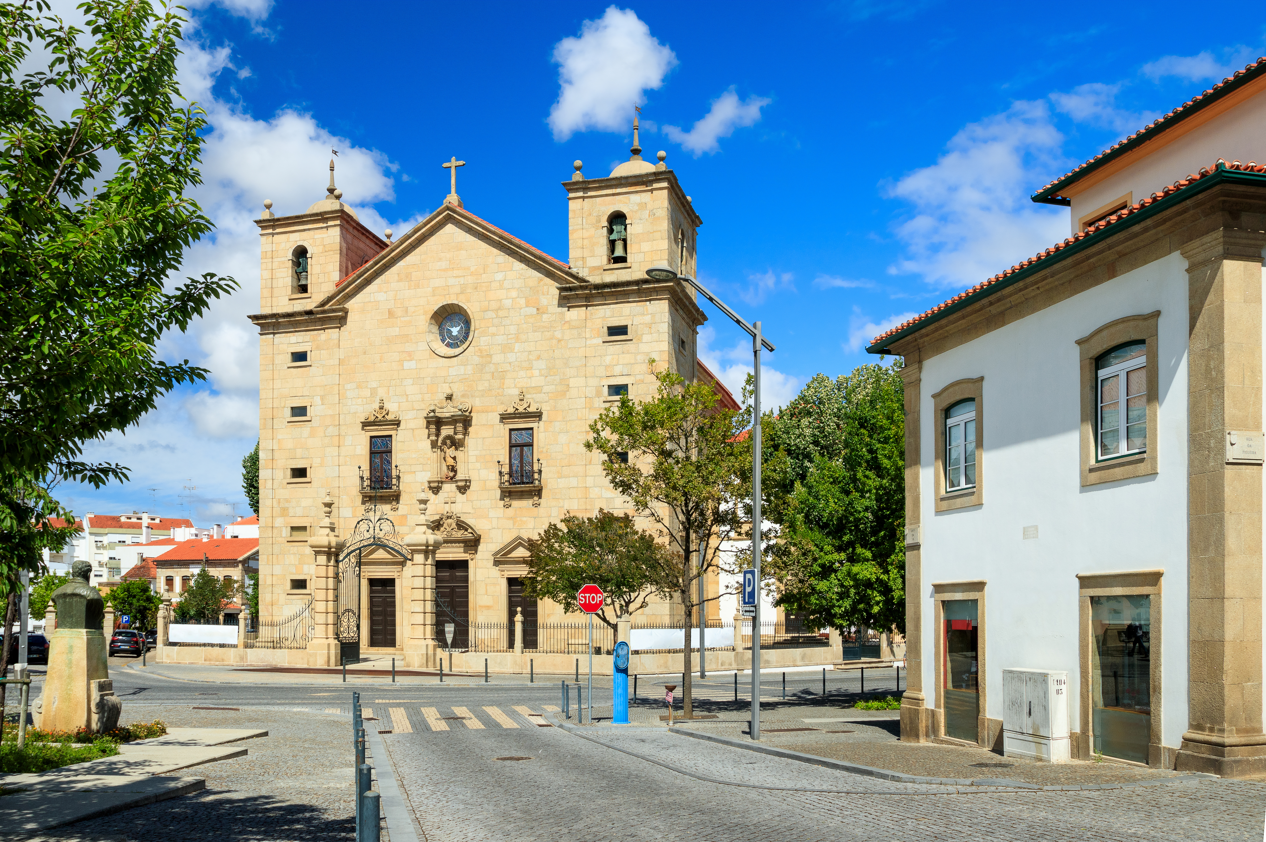 a building with a cross on the roof