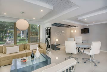 a room with a table and chairs