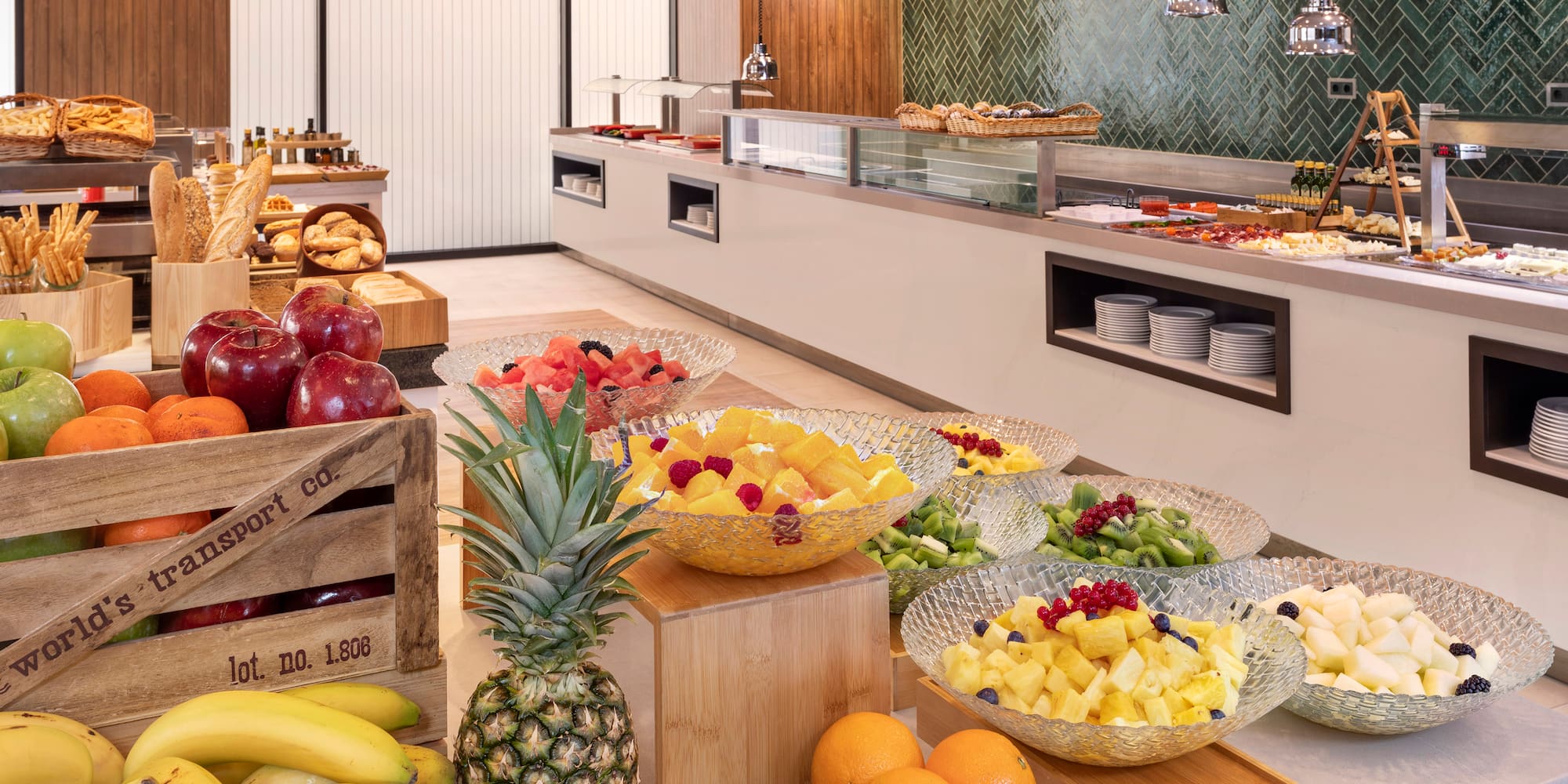 a buffet with fruit in bowls