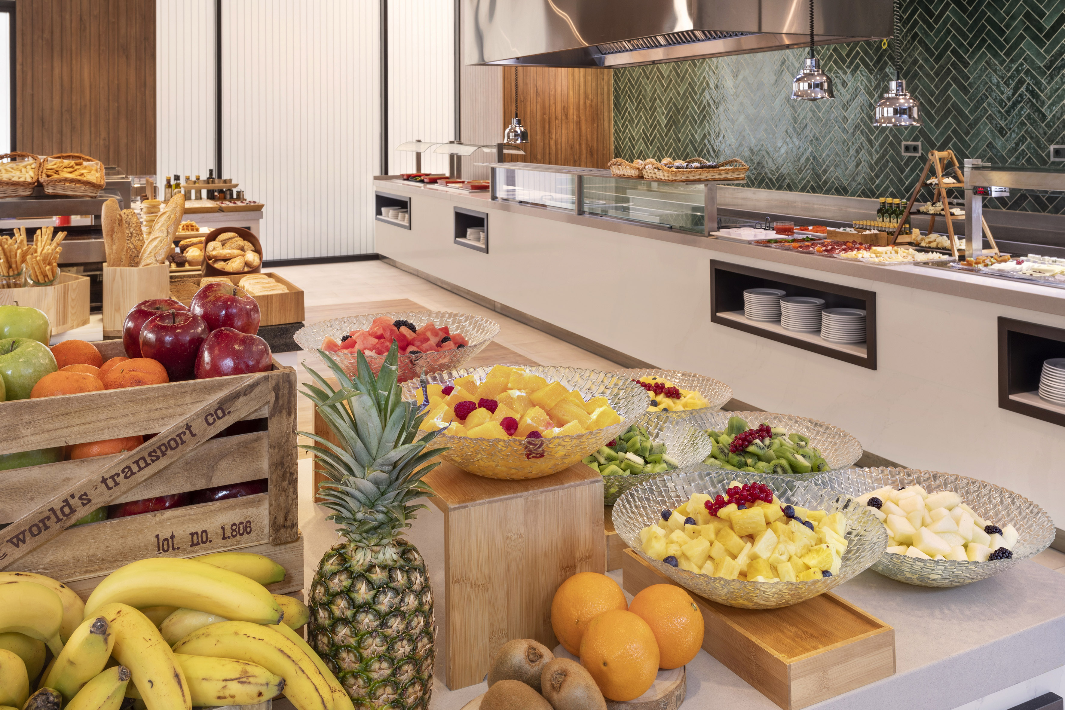 Bountiful breakfast buffet with fresh fruit, pastries, and savory options.