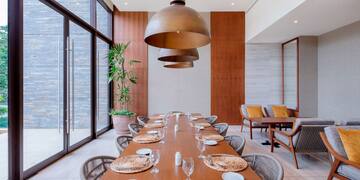 a long table with plates and plates on it