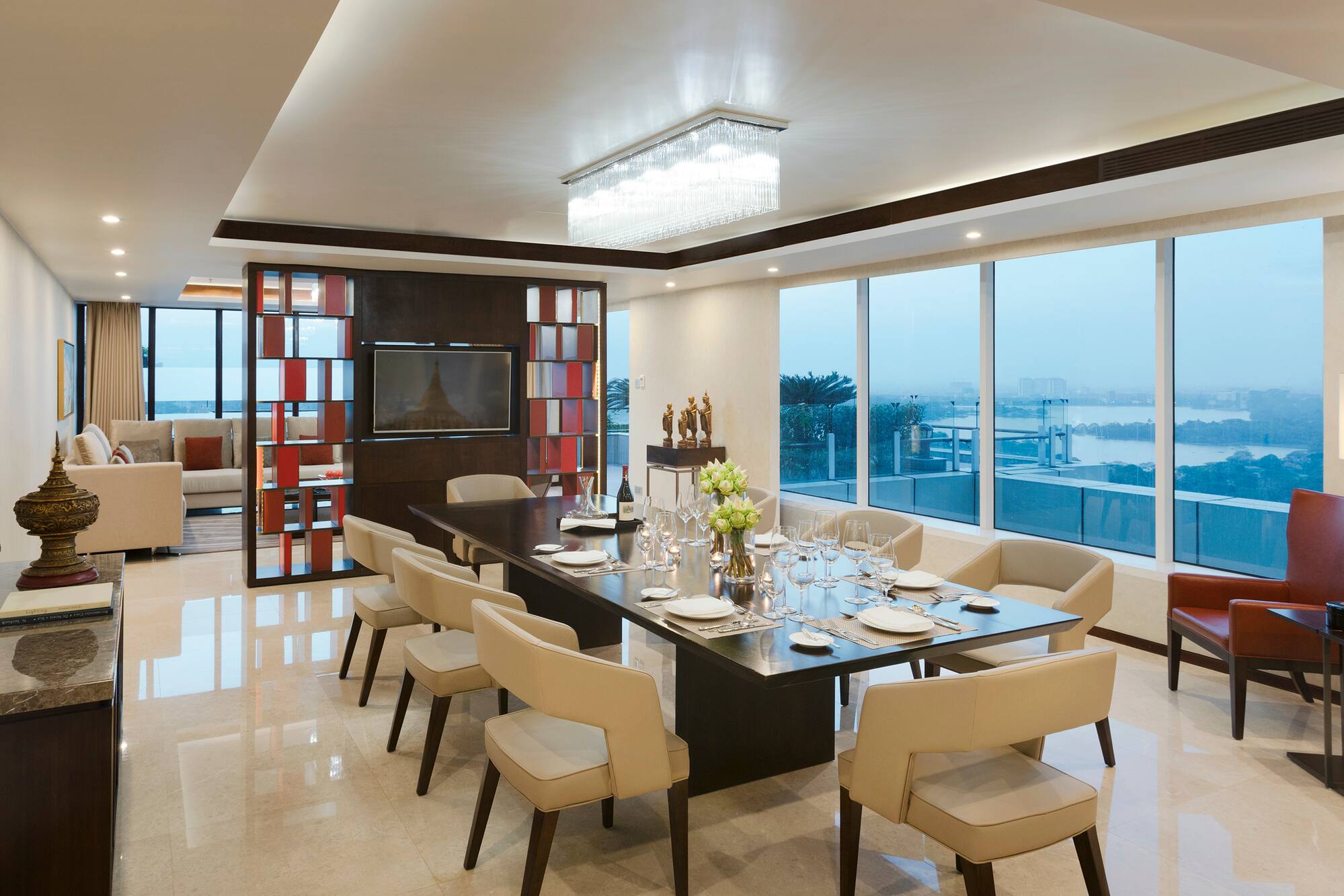 a dining room with a table and chairs