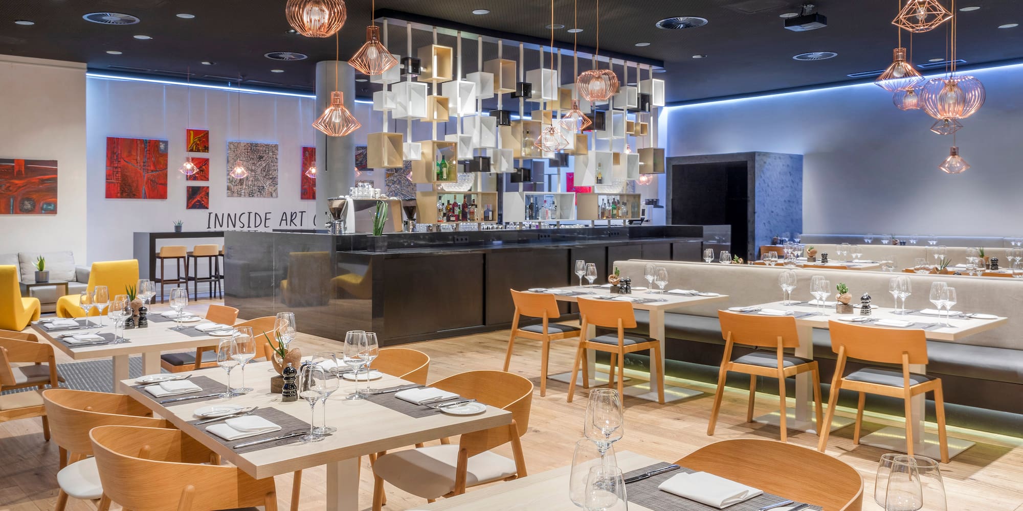 a restaurant with tables and chairs