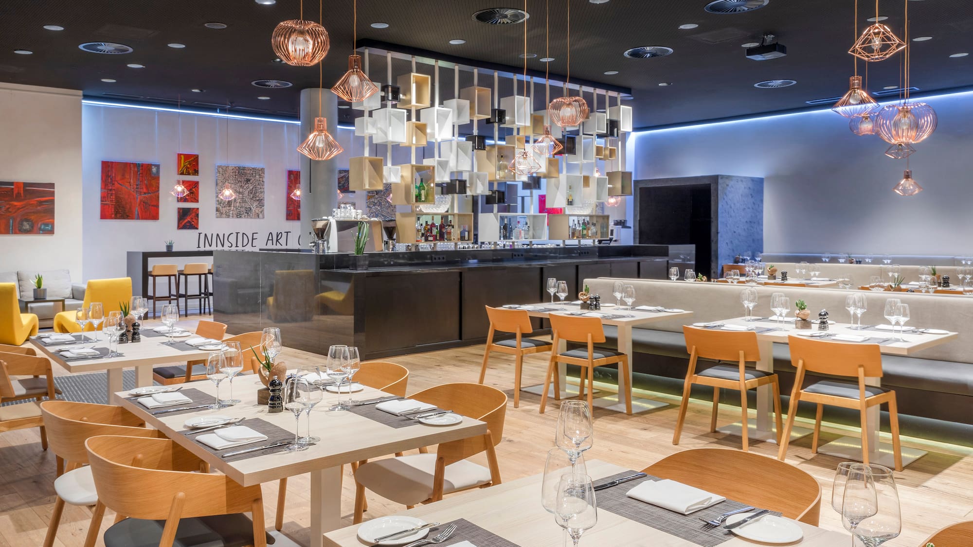 a restaurant with tables and chairs