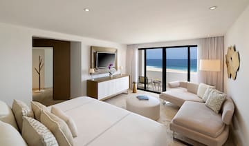 a room with a television and a bed