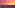 a city skyline with a pink and orange sky