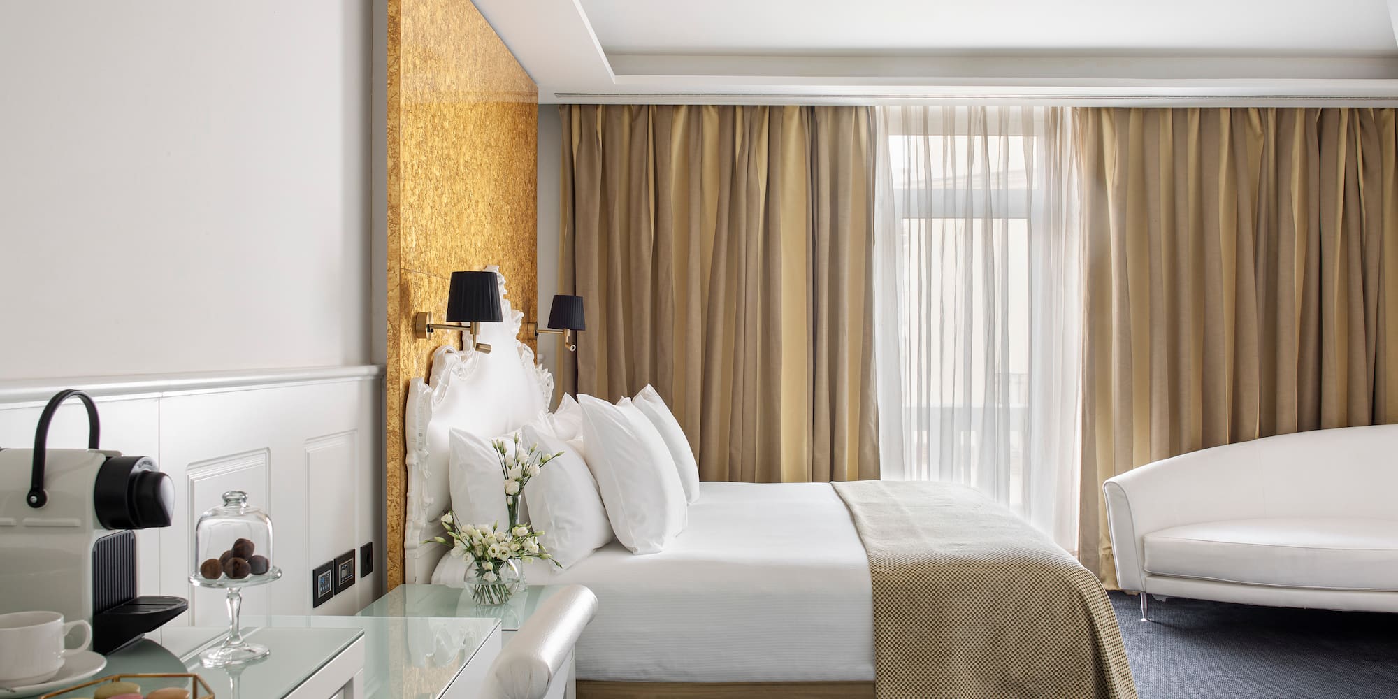 a room with a bed and a desk