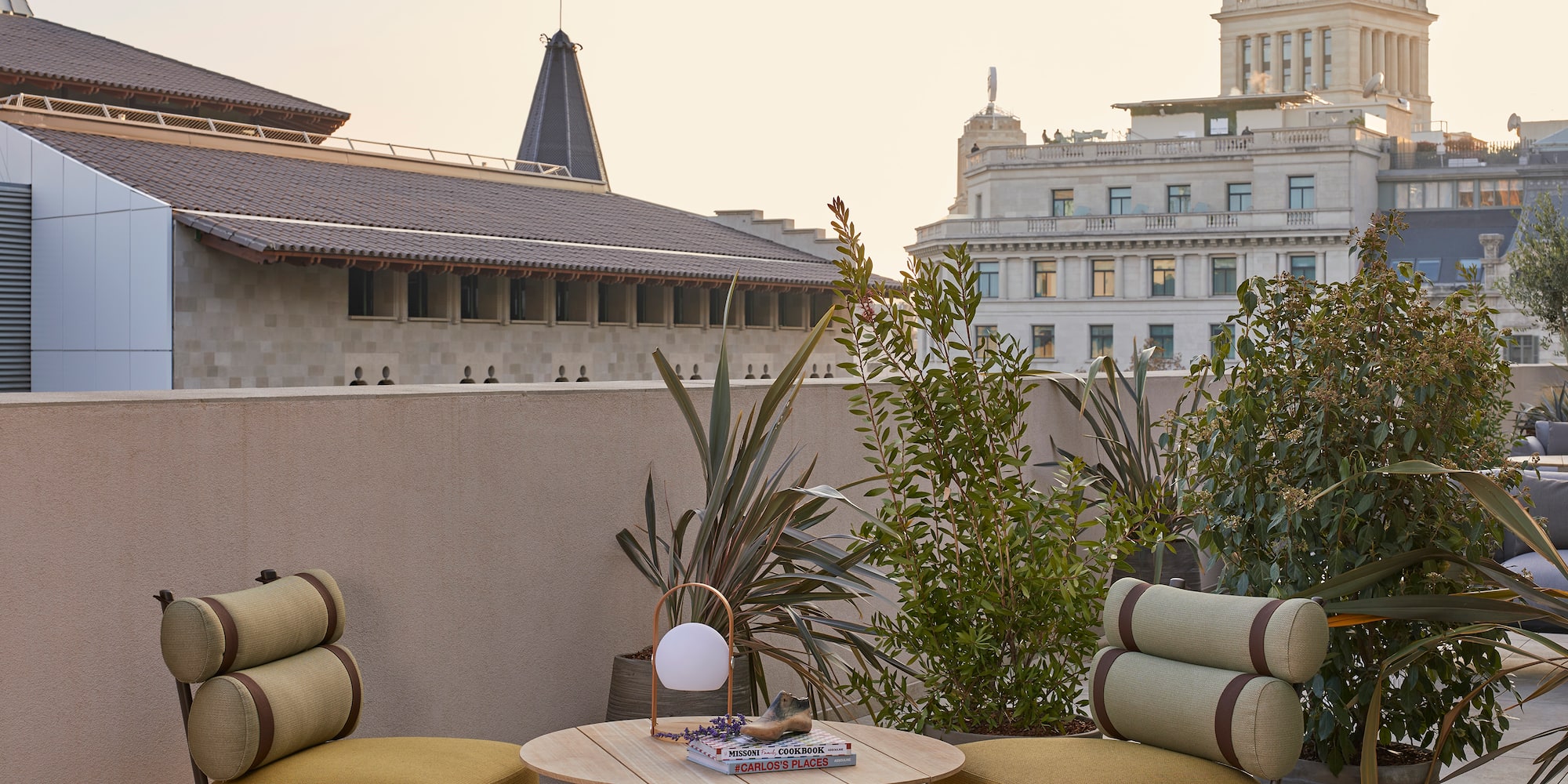 a patio with chairs and a table