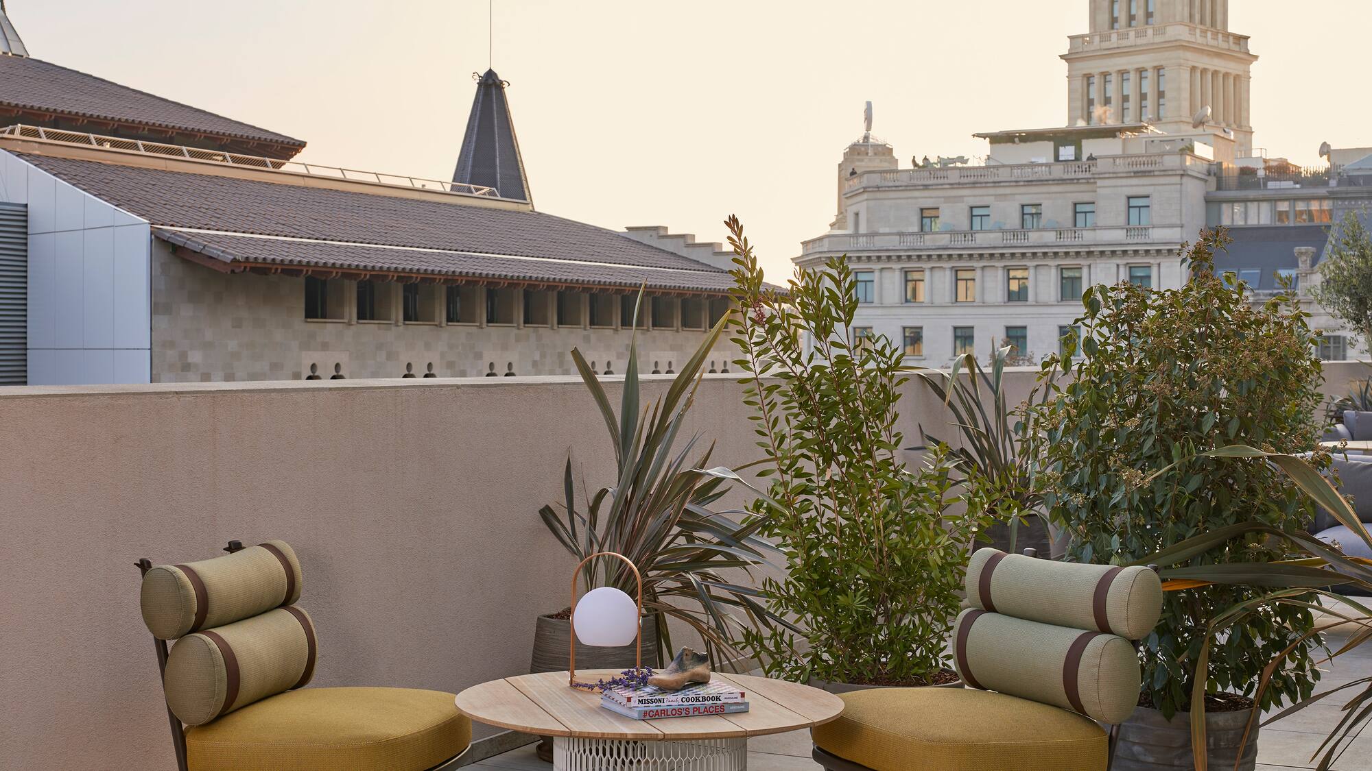 a patio with chairs and a table