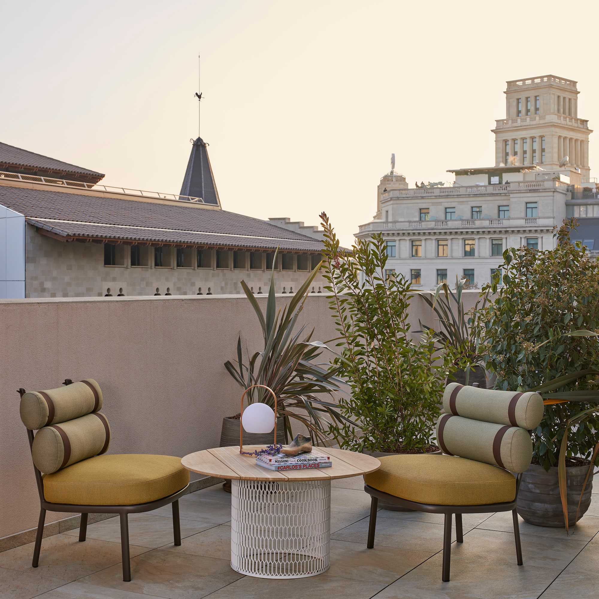 a patio with chairs and a table