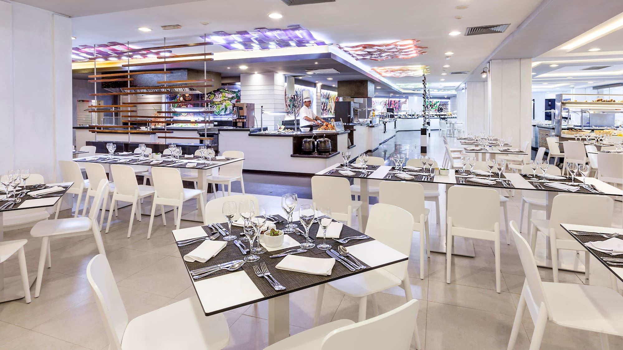 a restaurant with tables and chairs