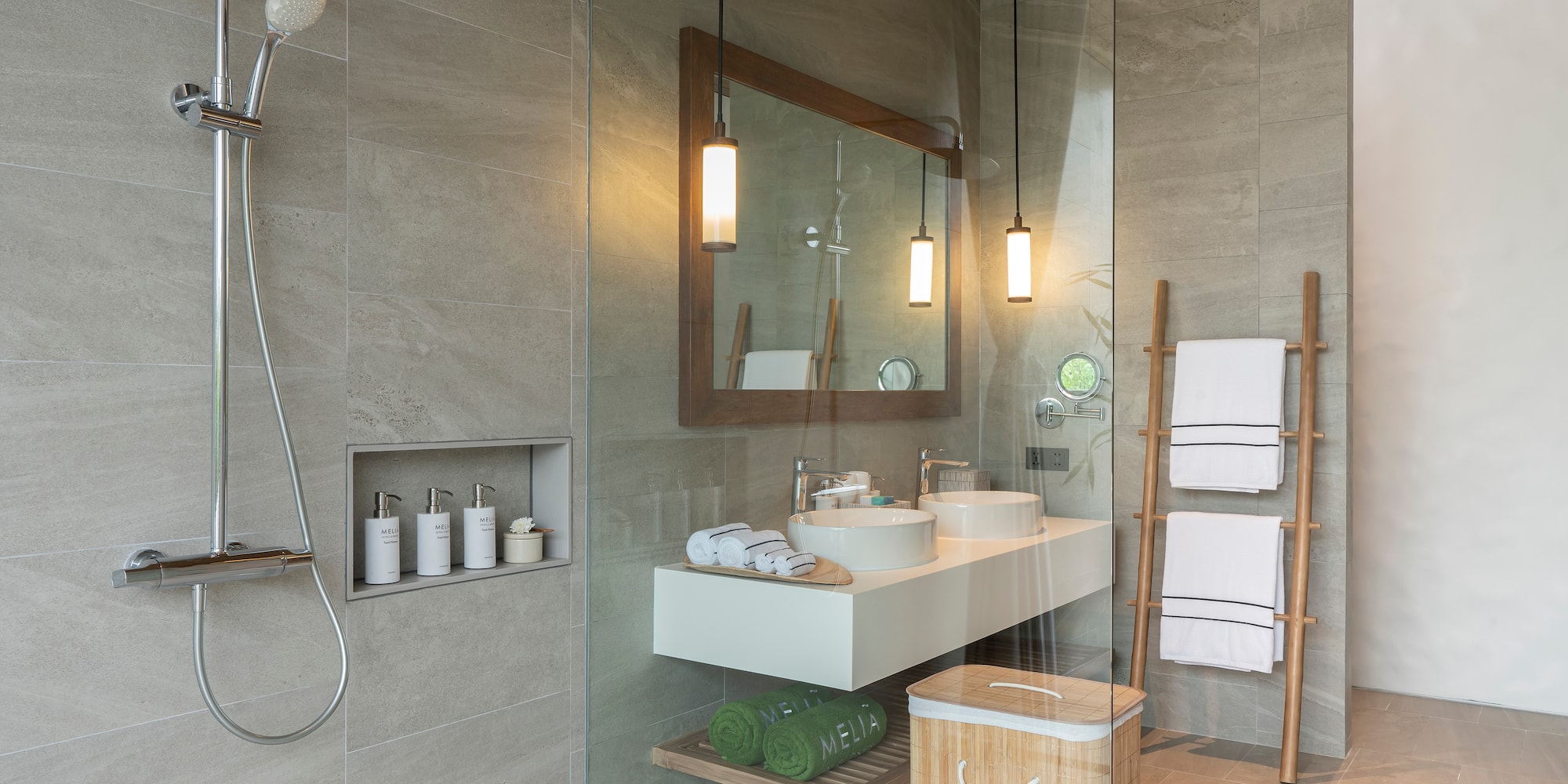 a bathroom with a shower and a sink