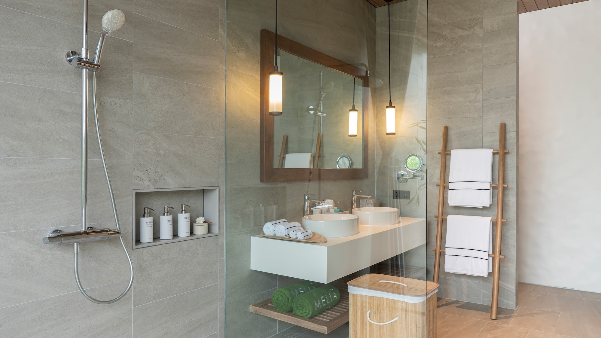 a bathroom with a shower and a sink