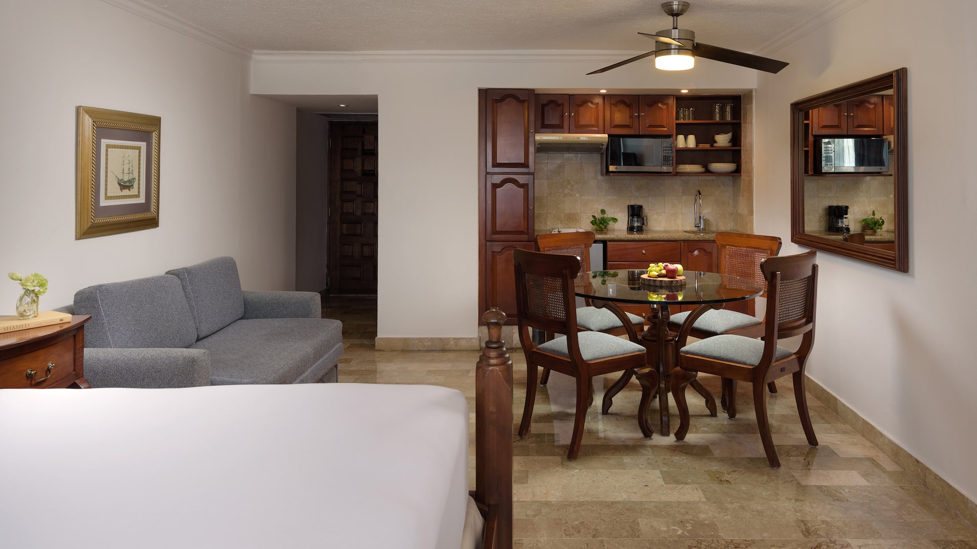 a room with a table and chairs