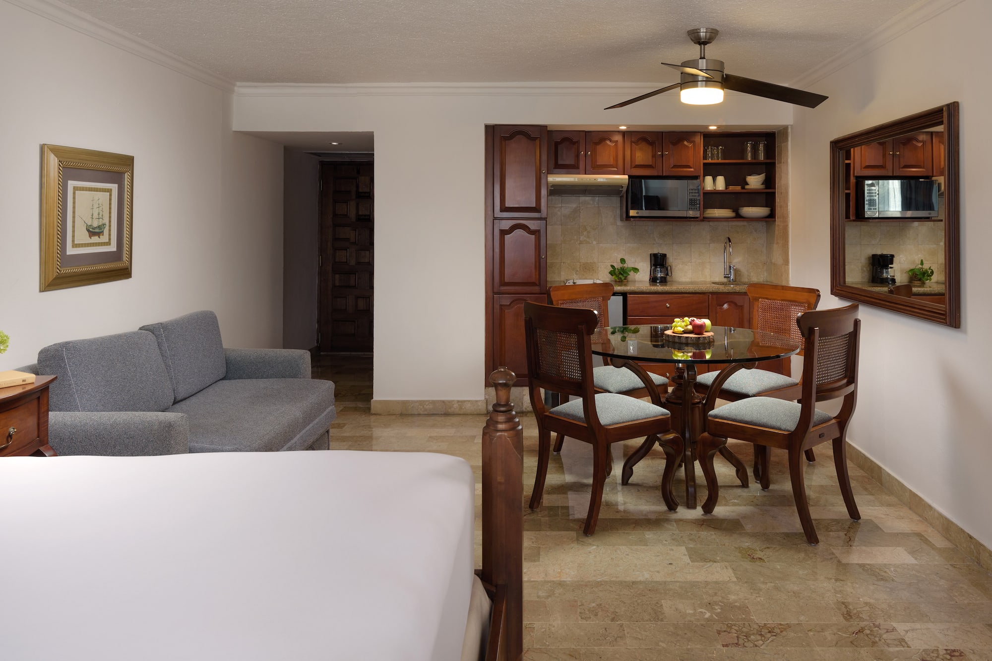 a room with a table and chairs