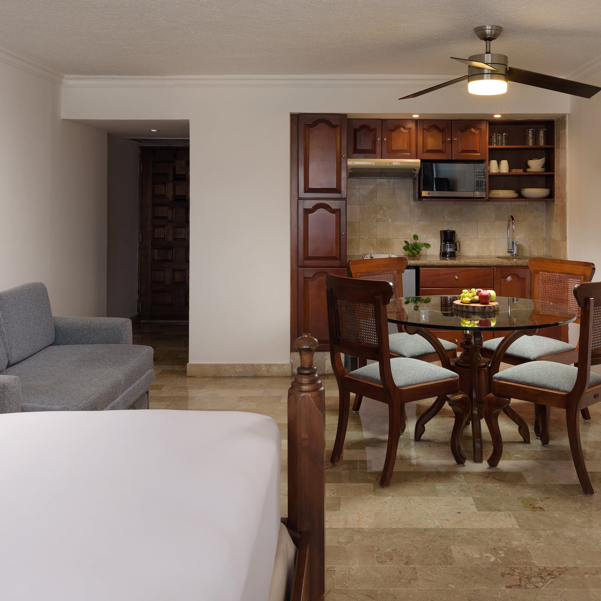 a room with a table and chairs