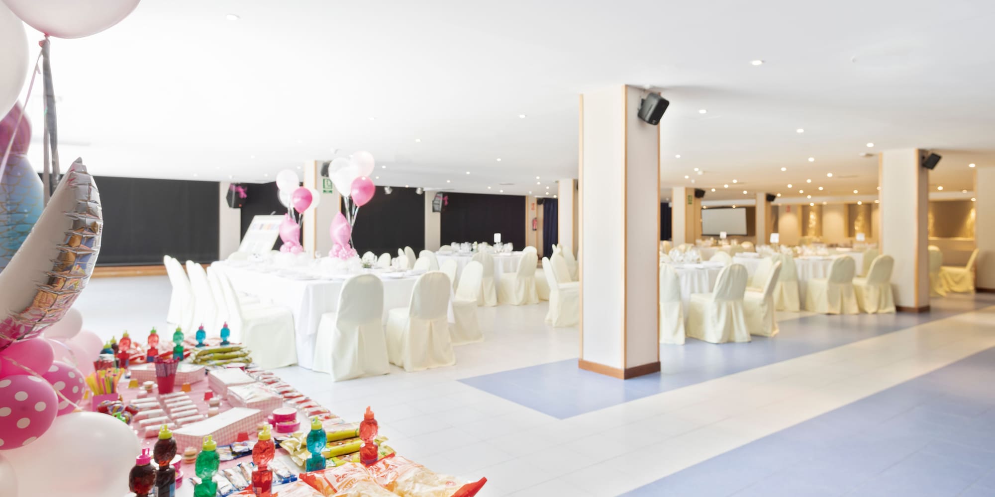 a room with tables and chairs