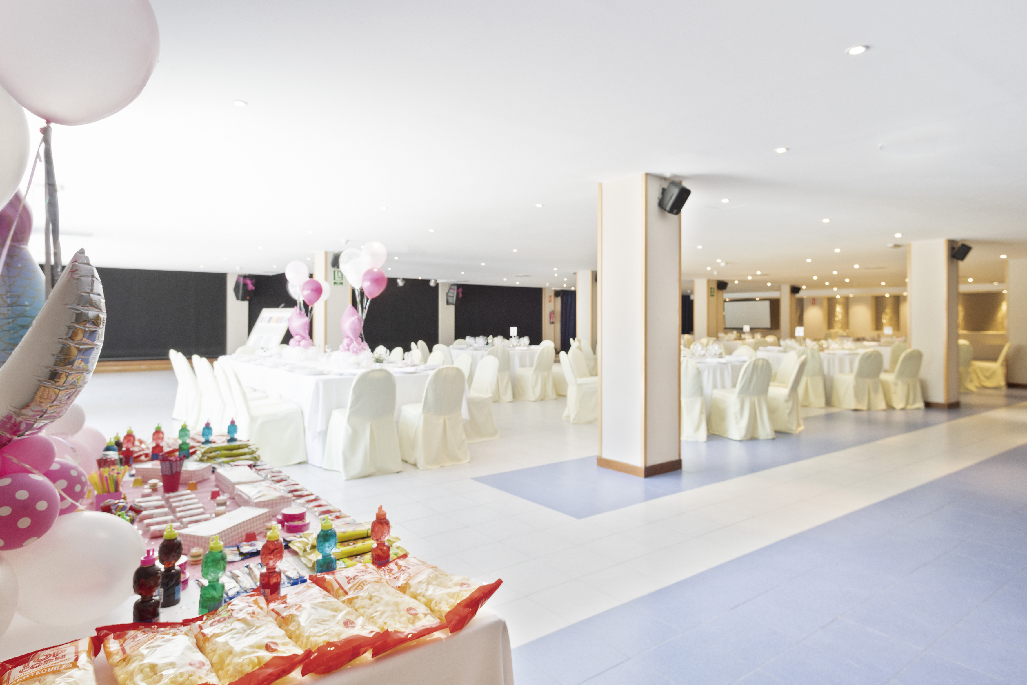 a room with tables and chairs