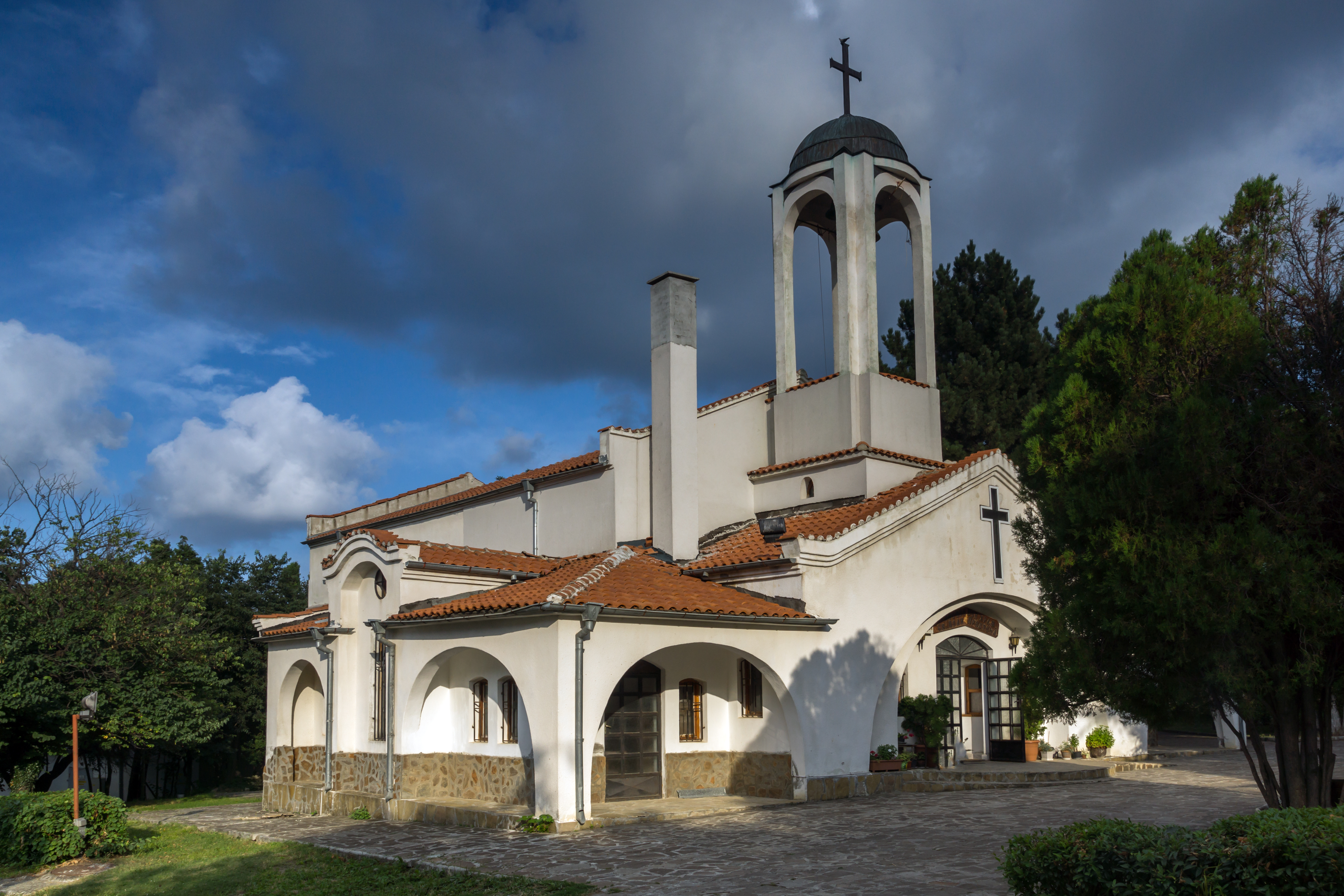 a white church with a cross on top