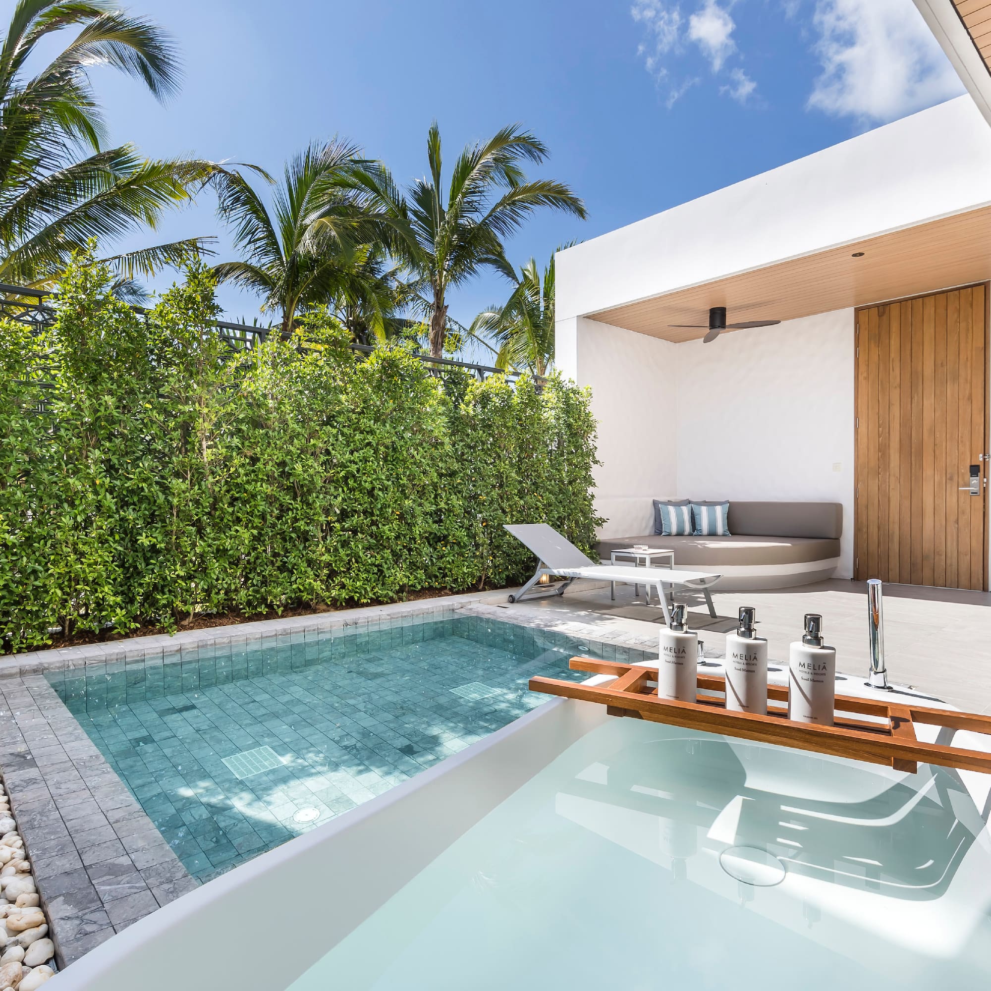a pool and a deck with a wood tray