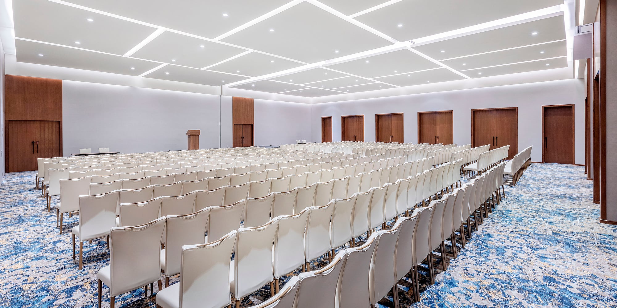 a room with rows of chairs