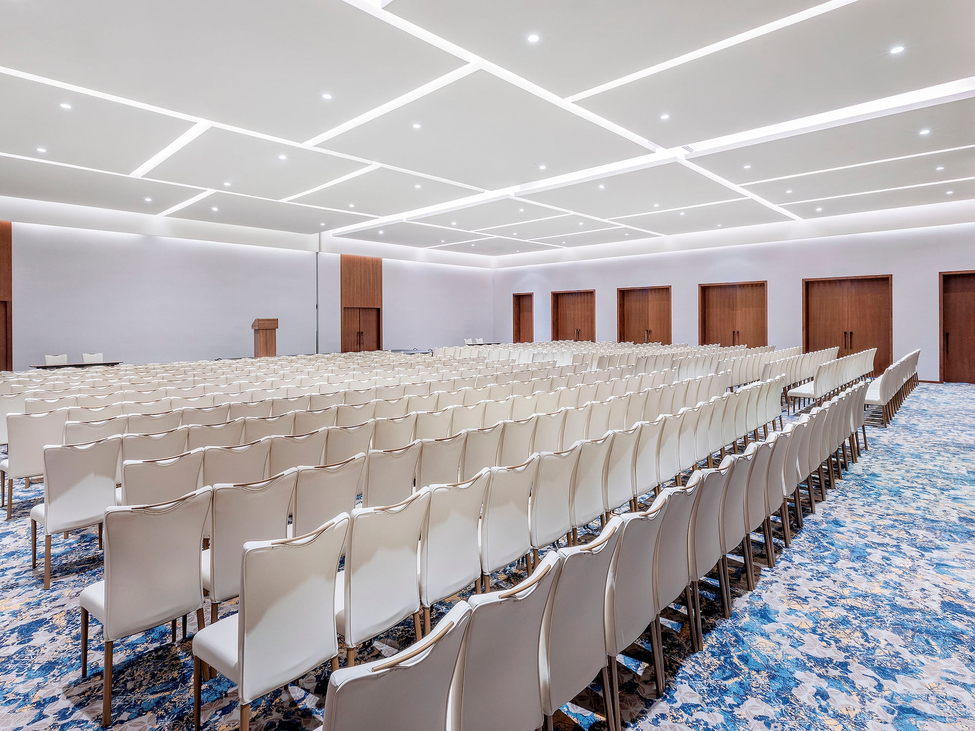 a room with rows of chairs