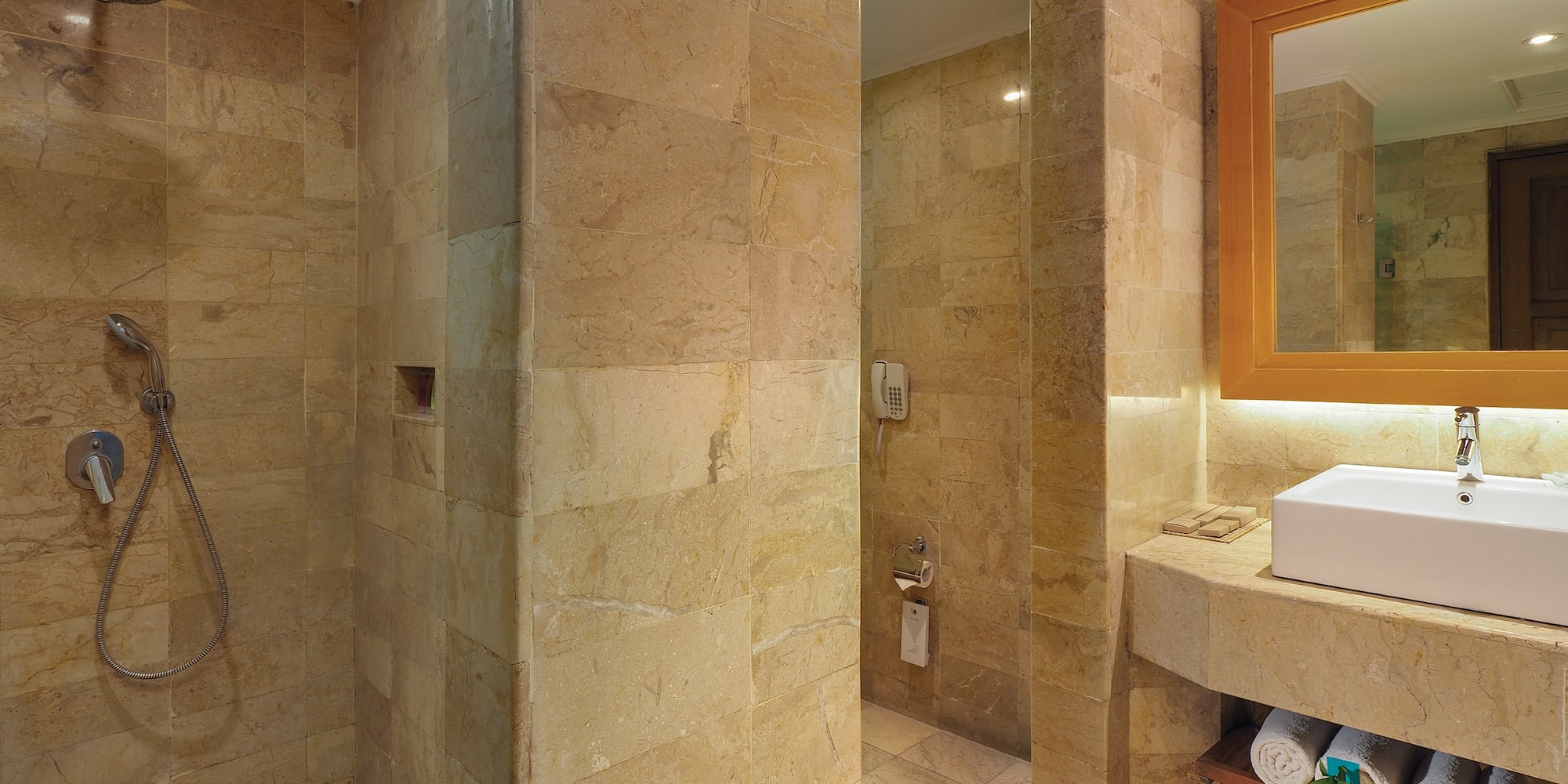 a bathroom with a sink and shower